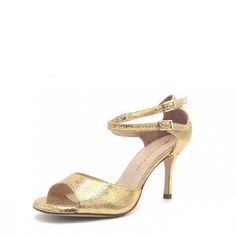 Lovely bright platinum gold embossed leather, fabulously elegant, neutral yet a show stopping design! The double ankle strap with closed back keeps your foot securely in the shoe at all times, from red carpets to dance floors. You can wear the ankle straps crossed or parallel, as the mood strikes you. This sandal beautifully supports your foot with the single toe band. The shoe is finished with a subtle signature brilliant adornment on the left heel. With a soft memory foam foot bed padding, you Bed Padding, Dance Floors, Tango Shoes, Red Carpets, Street Shoes, Shoe Bags, Foot Bed, Florence Italy, Outdoor Wear