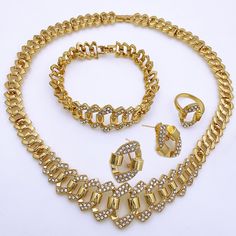 Afraic Jewelry-24k Dubai Gold Color Jewelry Set Rhinestones Jewelry Fashion Women Necklace Earrings Set Model Number:3256804598503480Pinformation:Material: Zinc alloyColor: Gold ColorProduct Package Details: 1 Set (Neckace, Bracelet, Earrings,Ring )Fashion Jewelry Gold Color Jewelry Sets For Women Necklace And Earrings Set PRODUCT TOVERALL STYLE：Elegant simple fashionable and luxurious show your beautiful temperament in all directions, Show the charm of urban women.Regardless of daily work or sh Gold Rhinestone Alloy Jewelry Sets, Gold Crystal Jewelry For Jewelry Making, Gold Alloy Jewelry Sets For Party, Gold Metal Jewelry Sets For Party, Gold Alloy Party Jewelry Sets, Formal Metal Jewelry Sets With Rhinestones, Gold Rhinestone Jewelry For Parties, Gold Crystal Costume Jewelry Sets, Gold Alloy Jewelry With Sparkling Stones