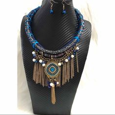 Multi Color Blue Tribal Style Rope Necklace With Chain Fringe. Includes Matching Earrings. Approx. 22” Chain Length With 6” Fringe. New Without Tags As I Purchased This And Never Wore It. Blue Bohemian Necklaces For Party, Blue Chain Costume Jewelry, Blue Costume Jewelry With Chain, Blue Costume Jewelry Necklace With Chain, Blue Beaded Jewelry Sets For Gift, Elegant Blue Jewelry For Festival, Adjustable Royal Blue Bohemian Jewelry, Adjustable Bohemian Royal Blue Jewelry, Bohemian Blue Chain Necklace