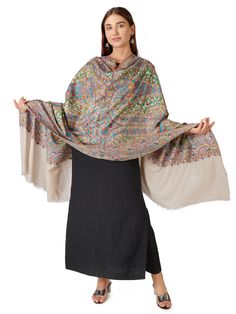 Experience sophistication with our Chic Pashmina Shawl, meticulously designed with elegant hand embroidery. Created from pure Kashmiri pashmina in a classic off-white shade, this shawl epitomizes luxurious comfort and timeless allure. Product Details: Hand Embroidered Pure Kashmiri Pashmina Shawl Material: Pure Pashmina (100% Cashmere) Size: 100 cm X 203 cm / 40 Inch X 80 Inch / 1.1 x 2.2 Yards (Approx) Base Color: Off White Embroidery: Intricate hand embroidery (Paper Mache Embroidery) Sourced Kashmiri Paper Mache, White Pashmina, Embroidery Paper, Hijab Trends, White Chic, Pashmina Shawl, Modern Wardrobe, White Embroidery, Formal Outfit