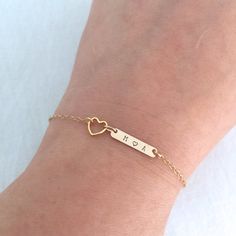 Dainty Anniversary Bracelet, Valentine's Gift, Gift for Her, Bar Bracelet, Heart Jewelry, Couple Bracelet, Me and Him, Small Bar♥ Available in Sterling Silver, 14K Gold Filled and 14K Rose Gold Filled♥ Please be sure to drop initials in the note box at checkout.♥ Specification:. Bar size 16 x 3.2mm. Heart Plated Charm size 7mm. Uppercase letter ONLY. Comes in a satin pouch. Length includes charm, jump ring, and clasp.IMPORTANT:Usually jewellery in the pictures looks bigger than in reality.Please Adjustable Chain Bracelet For Wedding On Valentine's Day, Adjustable Wedding Chain Bracelet With Heart Charm, Adjustable Heart Charm Chain Bracelet For Wedding, Adjustable Anniversary Chain Bracelet With Heart Charm, Dainty Heart Bracelet For Birthday And Mother's Day, Dainty Heart Bracelet For Mother's Day Birthday, Heart-shaped Bracelets For Birthday And Valentine's Day, Adjustable Chain Bracelet For Anniversary, Adjustable Chain Bracelet For Valentine's Anniversary