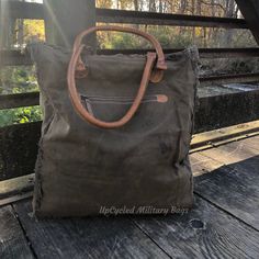 "Infantry Soldier Weekender Tote Bag made of Repurposed Military Canvas and CowHide with leather accents. Hair on Hide and UpCycled Canvas combined to make this gorgeous Large Weekender Tote that's made of repurposed military tent and tarp canvas. A classy, and impressive Bag ready for an overnight escapade, a day on the run, or to carry everything you need for an active life on the go. Great as a Military Mom or Wife gift. Purse * Large Tote * Shoulder Bag * Weekender DETAILS * Size: 16\" x 18\ On-the-go Satchel Bag With Leather Trim, Canvas Hobo Bag With Removable Pouch For Errands, Travel Waxed Canvas Bag With Top Carry Handle, Travel Bags With Top Carry Handle In Waxed Canvas, Leather Crossbody Bag For Errands, Everyday Use Travel Shoulder Bag With Handles, Everyday Use Shoulder Travel Bag With Handles, Leather Trim Hobo Tote Bag For On-the-go, Canvas Hobo Travel Bag