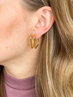 No piercing? No problem. Allergic to all metals? We got you. Introducing our newest line of clip on earrings, that will work for all types of skin types and hole-less lobes. Description: Clip-on piece has our resin, bendable piece to fit around your earlobe Metal: 18K Gold plated Stainless Steel Size: 22mm x 8mm Weight: 3g for one earring Modern Gold Pierced Cartilage Earrings, Everyday Metal Cartilage Earrings Pair, Everyday Metal Cartilage Earrings With Matching Pair, Modern Pierced Huggie Earrings, Modern Huggie Piercings, Trendy Hypoallergenic Piercings For Everyday, Everyday Gold Drop Earrings, Pierced Huggie Metal Earrings, Metal Huggie Earrings For Everyday