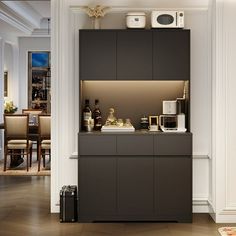 a kitchen with an oven, microwave and other items on the counter in front of it