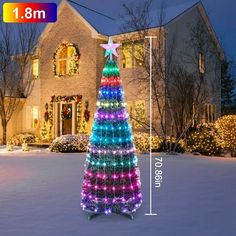 a christmas tree is shown in front of a house