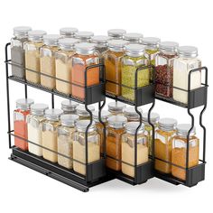 an assortment of spices and seasonings in glass containers on metal racks with black handles