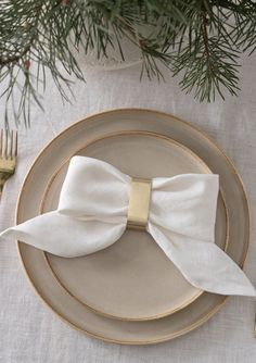 a plate with a white bow on it