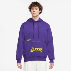 Los Angeles Lakers Courtside Statement EditionMen's Jordan NBA Fleece Pullover HoodieDon't let a little chill stand between you and your team. This loose-fit Jordan Courtside hoodie shows your love for the Los Angeles Lakers with proud graphics on supersoft fleece that brings the warmth in cooler temps.More Details Ribbed cuffs, hem and side panels Zippered and front pockets Body: 83% cotton/17% polyester. Hood lining: 100% cotton. Rib: 98% cotton/2% spandex. Loose fit for a roomy feel Machine w Lakers Courtside, Lakers Hoodie, Chicago Bulls Logo, Jordan Essentials, Jordans For Men, Los Angeles Lakers, Hoodie Design, Fleece Hoodie, Quarter Zip