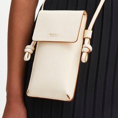 Ella Phone Pouch in Ivory Pebble | Aspinal of London Diy Leather Wallet, Leather Phone Pouch, Mobile Bag, Mobile Pouch, Diy Bag Designs, Cell Phone Pouch, Cell Phone Purse, Aspinal Of London, Phone Purse