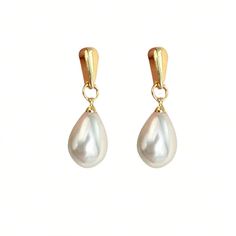 Description: Indulge in the opulence of these Pearlescent Waterdrop Earrings. The pearlescent waterdrops evoke a sense of luxury and sophistication, while the intricate details add an artistic touch. These earrings are the perfect statement piece to elevate any outfit. Affordable Luxury Jewelry High-Quality Gold Plating Versatile for Daily Wear Perfect Gift for Women Quiet Luxury and Individuality Combined Elegant Drop Pearl Pendant Earrings, Elegant Drop Pearl Earrings With Pendant, Elegant Pearl Teardrop Earrings For Formal Occasions, Elegant White Drop Pearl Earrings, Elegant Evening Teardrop Drop Earrings, Elegant Evening Teardrop Earrings, Formal Drop Earrings With Pearl Pendant, Formal Teardrop Earrings With Pearl Charm, Formal Drop Pearl Pendant Earrings