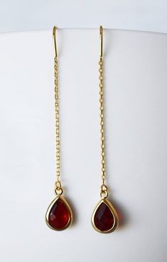 These beautiful January garnet birthstone earrings are perfect for a  wedding, birthday, anniversary, graduation, or for any occasion. The  silver, gold, or rose gold plated earring pendants are made of glass and  are a gorgeous deep red shade that shines beautifully when worn. #garnet #garnetbirthstone #garnetearrings  #octoberbirthstone #octoberbirthday #birthdaygift #giftforher  #girlfriendgift #birthstoneearrings #birthstonejewelry#dropearrings  #dangleearrings Silver Jewelry Handmade Earrings, Gifts For Engaged Friend, Dig Jewelry, Garnet Drop Earrings, January Birthday Gifts, Garnet Birthstone, Pretty Accessories, Earrings Ideas, Best Friend Jewelry