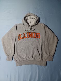 Beautiful quality OG Illinois Hoodie! Great collegiate style and great vintage feel. Tagged S, but fits bigger. Approx. 21 X 26. See pics for size and details! Classic piece. Vintage 1990s 2000s University of Illinois College Hoodie, Gray MV Sport S M Vintage Hoodie With Double-lined Hood For Sports, College Gray Fleece Hoodie, Gray Varsity Hoodie Sweatshirt, College Hooded Sweatshirt With Double-lined Hood, Hooded College Sweatshirt With Double-lined Hood, Cotton Varsity Hoodie With Adjustable Hood, Throwback Cotton Hoodie With Drawstring Hood, Gray Fleece Hoodie For College, Double-lined Hooded Sweatshirt For College