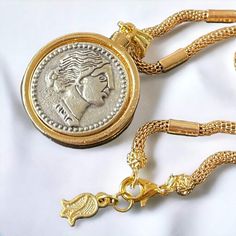 This stunning gold-plated Roman medallion necklace is something truly special! Not only does it look gorgeous, but the quality is just as impressive. The intricate details and dazzling colors will astonish anyone who lays eyes on it. It's perfect for those looking to add a little bit of style and elegance to their outfit. And what's even better is that, despite its luxurious appearance, this Roman medallion necklace doesn't break the bank! Get ready to be pleasantly surprised by this amazing pie Roman Necklace, Schmuck Gold, Two Faced, Roman Coins, Gold Jewelry Necklace, Medallion Necklace, Coin Necklace, Minimalist Necklace, Jewelry Gold