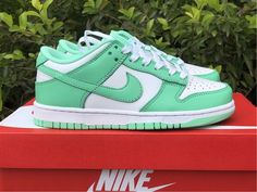 Dunk Low WMNS "Green Glow" Green Skate Shoes With Gum Sole For Streetwear, Green High-top Sneakers With Gum Sole For Streetwear, Green Low-top Basketball Shoes With Gum Sole, Green Custom Sneakers With Contrast Sole For Streetwear, Low-top Green Basketball Shoes With Gum Sole, Green Gum Sole Sneakers For Streetwear, Green Sneakers With Gum Sole For Streetwear, Sporty Green Custom Sneakers For Streetwear, Green High-top Skate Shoes With Gum Sole