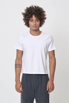 Tailored Trash Tee — Everybody.World Everyday Fitted White Muscle Tee, Stretch Muscle Tee With Crew Neck For Streetwear, White Stretch Muscle Tee With Crew Neck, Fitted Organic Cotton Short Sleeve T-shirt, Fitted Organic Cotton T-shirt, Fitted Organic Cotton T-shirt For Everyday, Sporty Fitted Everyday T-shirt, Fitted Basic Organic Cotton Top, Fitted Basic Top In Organic Cotton