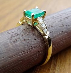 We designed and handmade this very petite ring. The center 6.3 x 4.4 mm Natural Emerald weight is .67cts. With 6 diamonds TCW is .10cts. It is made in 18k natural yellow gold Ring size is 6 We can make it any size from 5-7 and you still be able to return it within the listed time frame. Sizing outside of that range requires a resize fee if for any reason the ring is retuned. Ring sizing may add additional handling time. We love this ring because it represents the way jewelry should be made with Fine Jewelry Diamond With Certificate Of Authenticity, Fine Diamond Jewelry With Certificate Of Authenticity, Anniversary Diamond Jewelry With Certificate Of Authenticity, Fine Jewelry With Certificate Of Authenticity As Gift, Fine Jewelry Gift With Certificate Of Authenticity, Fine Jewelry As A Gift With Certificate Of Authenticity, Gold Diamond Jewelry With Certificate Of Authenticity, Art Deco Gia Certified Emerald Ring As Gift, Gia Certified Art Deco Emerald Ring Gift