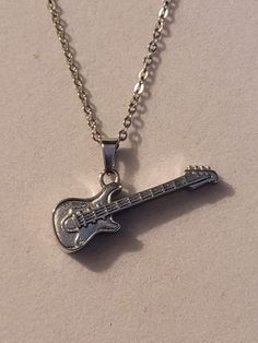 Monkey Jewelry, Guitar Necklace, Spiderman Outfit, Guitar Pendant, Silver Guitar, Human Remains, Pretty Jewelry Necklaces, Urn Necklace, Urn Necklaces