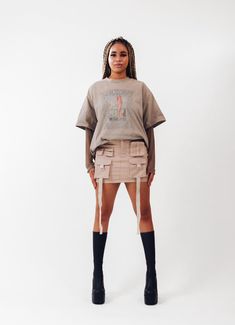 Get ready to amp up your streetwear game with our freshest creation - introducing the ACS Mini Cargo Skirt! We've poured our techwear and streetwear passion into this beauty, and we can't wait for you to experience it firsthand. *Intricate Design, Striking Look: Dive into the dynamic front design, featuring cargo pockets and hanging straps. This combination crafts a unique silhouette that effortlessly catches attention, making each step a statement. *Beige Colorway: Elevate your wardrobe with the versatile light beige hue. It effortlessly complements your existing collection, offering a canvas for endless creative pairings. *Perfect Mini Length: The ACS Mini Cargo Skirt strikes the ideal balance between mini and comfort  *Customized Comfort, Adjustable Waistband: Experience the luxury of a Edgy Mini Skort For Streetwear, Edgy Streetwear Skirt With Pockets, Casual Mini Skirt For Alternative Fashion, Y2k Mini Skort For Streetwear, Y2k Mini Skirt For Streetwear, Edgy Streetwear Mini Skirt With Pockets, Edgy Mini Skirt With Pockets For Streetwear, Y2k Style Mini Skort For Streetwear, Y2k Fitted Skirt For Streetwear