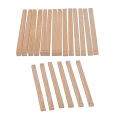 wooden dows are laid out on a white background