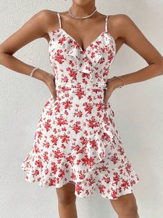 This beautiful WYWH Floral Print Ruffle Trim Wrap Knot Side Cami Dress is the perfect addition to your summer wardrobe. Its lightweight and flowy fit is crafted from 95% Polyester and 5% Elastane fabric, with fresh all-over floral print accents and ruffle and wrap detail that add a touch of boho-chic to your look. The sleeveless spaghetti strap dress features a high waist and regular fit, perfect for twirling in the sunshine. Style: Boho Pattern Type: Floral, All Over Print Details: Ruffle, Wrap