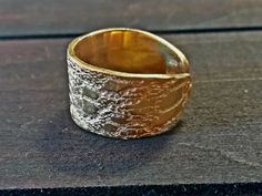 Modern anniversary ring made with 24K gold plated silver. I use only first quality materias for my jewelry. I made this ring by using the lost wax method. That means I make this piece in wax by hand carving it. Then I bring it to the foundry and I work with to have this cast. The ring is adjustable. * This item is made to order handcrafted and shipped by me, so it may take at least one week before shipping. You can contact me if you want something to arrive earlier, I will do my best. ** All my Gold Dome Ring With Thick Band As Gift, Gold Dome Ring With Thick Band, Gold Plated Dome Ring With Thick Band For Gift, Gold Dome Ring With Thick Band For Gift, Gold Plated Wide Band Ring As Gift, Handmade Gold Plated Rings For Promise, Handmade Anniversary Ring With Thick Band, Gold Hand Forged Rings For Promise, Gold Hand Forged Promise Ring