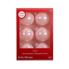 pink glass christmas ornaments in a box