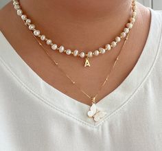 "ITEM DETAILS: * Material: Tiny Freshwater Pearl Gold Plated Beads Nickel Free Hypoallergenic * Size Chain: 15\" + Ext 2\" 16\" + Ext 2\" Each Necklace is Handmade 💕 Set Zodiac: Pearl Chain 15\"+ Figaro Chain 18\"+Pearl Zodiac Set Bee: Pearl Chain 15\" + Box Chain 18\" + Bee Set Initial: Pearl Chain 15\" + Box Chain 18\" + Initial * Shipment: Everything Is made to order. Order preparation may tak 3 To 5 business day. * Packaging: The jewels are packed and delivered in a beautiful packaging, ide Pearl Beaded Chain Charm Necklace As Gift, Pearl Charm Necklaces With Beaded Chain As Gift, Pearl Beaded Charm Necklace Gift, Pearl Beaded Charm Necklace As A Gift, White Pearl Charm Necklace With Round Beads, White Charm Necklace With Pearl And Round Beads, Pearl Beaded Charm Necklaces As Gift, White Beaded Pearl Charm Necklaces, Elegant White Beaded Charm Necklaces