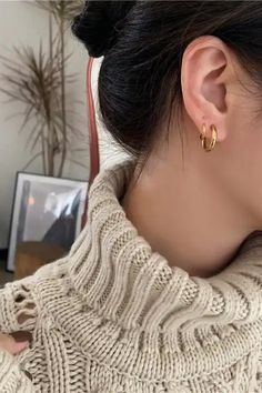 Get ready to double up your style game with the Laine hoops Faux Double Piercing Huggie Earrings! These earrings are the perfect way to add some sass to your look without the need for extra piercings. Crafted from premium 18K gold and super-strong 316L stainless steel, these earrings are as durable as they are chic. The huggie-style hoops are comfy enough to wear all day long, so you can strut your stuff in style. The best part? These earrings are totally sweat and water-resistant, so you can we Trendy Gold Hypoallergenic Piercings, Trendy Gold Metal Piercings, Trendy Gold Hypoallergenic Clip-on Earrings, Gold Small Hoop Plug Earrings, Gold Plated Small Hoop Clip-on Earrings, Trendy Gold Cartilage Earrings, Gold Metal Piercings, Trendy Gold Ear Wire Piercings, Trendy Gold Tarnish-resistant Piercings