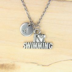 ♥ Swimming Necklace Silver I Love Swimming Charm Necklace Sport Gift Swimming Charms Swimming Gift Initial Necklace ♥ This is a beautiful I Love Swimming charm with hand stamped initial charm on a stainless steel chain, You able to choose initial from a drop down menu, ♥ You will receive 1 necklace ♥ I Love Swimming charm 15x22x2 mm ♥ Initial charm 10 mm choose from a drop down menu ♥ Stainless steel chain 18 inches ♥ additional initial https://www.etsy.com/listing/766732811 If you need help wit Silver Stamped Charm Necklaces For Valentine's Day, Silver Stamped Charm Necklace For Valentine's Day, Valentine's Day Silver Stamped Charm Necklaces, Personalized Letter Charm Necklaces, Valentine's Day Stainless Steel Nickel-free Charm Necklace, Metal Letter Jewelry For Gift, Metal Letter-shaped Jewelry For Gifts, Letter-shaped Metal Jewelry For Gifts, Metal Letter-shaped Jewelry As Gift