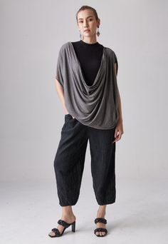 "🚚..ALL ORDERS ARE SHIPPED VIA DHL EXPRESS MAIL Incredibly comfy to wear all day, evening and night, great over pants, skirt or just about anything else; instant style that is both practical and easy to wear. A deep cowl neckline mimics the rounded, uneven hem, giving a loose-fitting a casual ease. The fold-over collar comes to crisp points, the neckline has a buttonhole and two buttons that allows you to change the drape of the collar. This makes the shirt versatile to wear and a precise pleat Drapey Asymmetrical Summer Tops, Versatile Draped Summer Top, Relaxed Fit Asymmetrical Tops For Layering, Slouchy Top For Summer Layering, Summer Layering Top With Relaxed Fit, Summer Slouchy Tops For Layering, Versatile Draped Tops For Spring, Asymmetrical Cotton Top With Relaxed Fit, Casual Drapey Tops For Layering