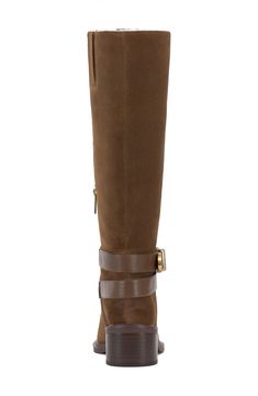 A buckled ankle strap and mixed textures add visual intrigue to a knee-high leather boot balanced by a slender square toe and stacked block heel. 1 3/4" heel 14 1/2" shaft; 14 1/2" regular calf circumference 14 1/2" shaft; 16" wide calf circumference 14 1/2" shaft; 17" extra-wide calf circumference Side zip closure with elastic gore inset Leather upper/synthetic lining/rubber and synthetic sole Imported Brown Knee-high Heeled Boots With Buckle Closure, Brown Buckle Closure Knee-high Boots For Work, Brown Knee-high Boots With Buckle For Work, Knee High Leather Boots, Wide Calf, Leather Boot, Vince Camuto, Knee High Boots, Side Zip