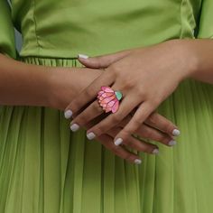 It's a testament to nature's artistry. Delicately enameled to mimic the soft hues of blooming flowers, this adjustable ring is a celebration of femininity and strength. Each petal is a brushstroke of elegance, capturing the essence of a blossoming lotus. With Blossomira, wear the beauty of nature on your finger FEATURES: Handmade in Chicago 22k Gold Plating on Hypoallergenic Metals Hand Painted Enamel One size fits all (adjustable ring) Dimension: 1.2" x 1" Weight: 10 gms NOTE: Each piece is han Blooming Lotus, Enamel Ring, Blooming Flowers, Blue Rings, 22k Gold, Adjustable Ring, Adjustable Rings, Gold Plating, Deodorant