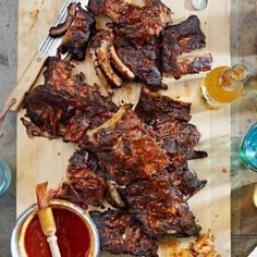 barbecue chicken wings with bbq sauce on a baking sheet, ready to be eaten