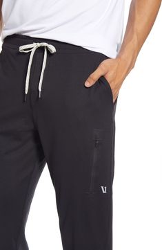 Stretchy, moisture-wicking fabric keeps you going at any intensity in lightweight sweatpants sporting multiple zip pockets for stowing keys and energy gels. A fuller cut in the seat and thighs and tapered legs make the fit comfortable and easy to move in. Style Name:Vuori Sunday Performance Jogger Sweatpants. Style Number: 5923178. 4-way Stretch Sportswear Joggers With Side Pockets, Functional Athletic Fit Joggers With Elastic Waistband, Casual Joggers With Functional Pockets For Jogging, Athleisure Joggers With Moisture-wicking, Casual Jogging Pants With Functional Pockets, Casual Jogging Bottoms With Functional Pockets, Functional Midweight Moisture-wicking Joggers, Functional Moisture-wicking Midweight Joggers, Black Comfort Stretch Joggers For Jogging