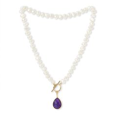 A gorgeous pearl necklace for your wardrobe all year round with an exquisite amethyst drop.    Whether worn with a crisp white shirt or a long floating maxi dress - this will be your go-to necklace for all occasions!    Single strand 7-8mm white irregular-shaped cultured freshwater pearl necklace with an amethyst drop set in 18kt gold vermeil with a gold plate toggle clasp - 18" approx. in length.  Please note amethyst varies in colour and can appear darker than in the pictures Pearls are quite soft and need special care after you wear them. Always store them in a separate jewellery pouch away from other jewellery and it is best to keep them in something soft.  From time to time, after you wear your pearls you should wipe them with a soft damp cloth to prevent dirt, chemicals and perspirat Teardrop Pearl Gemstone Necklaces, Pearl Teardrop Gemstone Necklaces, Teardrop Pearl Necklace With Gemstone, Teardrop Pearl Necklaces With Gemstones, Purple Pearl Necklace With Pearl Pendant, Elegant Amethyst Necklace With Pearl Pendant, Elegant Purple Pearl Drop Necklace, Purple Pearl Drop Necklaces, Freshwater Pearl Jewelry