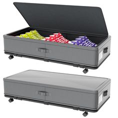 two storage boxes with playing cards in them