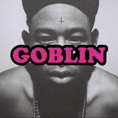 a black and white photo with the word goblin in front of it's face