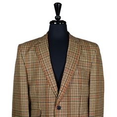 This Chiragh Apparel blazer is an elegant upgrade on dapper tailoring and features rich shades in a sumptuous fabric for elegant opulence. Fashioned from premium quality wool, this plaid check blazer features full lining in Japanese silk, a notch lapel, two-button closure and a single-vented back. A left chest pocket and three flap pockets appoint the front while the inside has two (2) pockets on the left and one (1) pocket on the right. A flash of contrast piping is added to the jacket lining i Formal Tweed Blazer With Suit Collar, Formal Tailored Tweed Sport Coat, Tailored Tweed Sport Coat For Formal Occasions, Tweed Blazer With Suit Collar For Semi-formal Occasions, Semi-formal Tweed Blazer With Suit Collar, Fitted Tweed Blazer For Business Casual, Tailored Long Sleeve Sport Coat For Semi-formal Occasions, Elegant Tweed Blazer For Business Casual, Fitted Tweed Sport Coat For Semi-formal Occasions