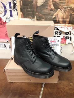 These are a rarer version of a Dr Martens 6 hole boot. They are finished in a beautiful looking leather.  Its soft too feel and has a nice crinkle finish. The leather is a natural black colour and has a darker sole unit and black stitched welt to complete its look. We have a few pairs available in SIZES 6-11. Don't miss out.  Once these are sold they are gone forever. Grunge Leather Ankle-high Martin Boots, Grunge Ankle-high Leather Martin Boots, Casual Combat Boots With Leather Lining, Grunge Leather Boots For Streetwear, Leather Grunge Ankle-high Combat Boots, Grunge Ankle-high Leather Combat Boots, Leather Lace-up Boots For Streetwear In Grunge Style, Grunge Leather Lace-up Boots For Streetwear, Casual Lace-up Combat Boots With Leather Lining