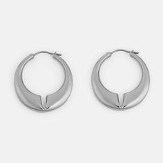 The Lune is a contemporary hoop earring with rounded edges and a deep notch at the center of the design. The domed effect tapers towards the ends, finishing with a minimal pin closure. Materials: Stainless Steel Bracelet Sizes, Earings Piercings, Ring Size, Hoop Earrings, Stainless Steel, Gold, Design