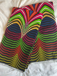 Beautiful Ankara fabric 6 yards. This is a quality Ankara print 100% cotton. Returns accepted. Ankara Fabric With Vibrant Patterned Print, Vibrant Patterned Ankara Fabric, Multicolor Cotton Fabric With Vibrant Print, Cotton Fabric With Vibrant Multicolor Print, Vibrant Multicolor Cotton Fabric, Cotton Fabric With Vibrant Patterned Print, Vibrant Print Cotton Fabric, Vibrant Print Patterned Cotton Fabric, Patterned Cotton Fabric With Vibrant Print