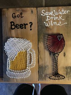 two wooden signs with wine glasses on them