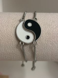 These unique friendship or couples matching bracelets are the perfect gift for your best friend or significant other! Yin and Yang. / (jɪn) / noun. two complementary principles of Chinese philosophy: Yin is negative, dark, and feminine, Yang positive, bright, and masculine. Their interaction is thought to maintain the harmony of the universe and to influence everything within it. Matching Gifts For Friends, Casual Adjustable Chain Jewelry For Friendship, Nickel-free Silver Friendship Bracelet, White Adjustable Chain Bracelets For Friendship, Silver Friendship Bracelets For Best Friend Gift, Trendy Silver Hypoallergenic Friendship Bracelets, Trendy Hypoallergenic Silver Friendship Bracelets, Silver Spiritual Friendship Bracelets, Silver Adjustable Friendship Bracelet For Best Friend