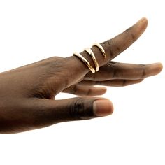 The Amali Open Ring stands out effortlessly with its subtle, soft curves. Perfect to wear solo or with your favorite ring stack. In Swahili, Amali means hope. Handcrafted by artisans in Kenya with 24k gold plated brass using traditional techniques. Maximum thickness: 0.11in (3mm) Minimum thickness: 0.07in (2mm) Height: 1in (25.4mm) Size Chart Open Ring Gold, Stackable Necklaces, Ring Stand, Stacked Earrings, Stackable Bracelets, Open Ring, Chain Choker, Favorite Rings, Wood Jewellery