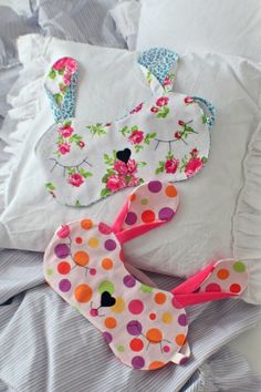 the pillows are made to look like they have been decorated with flowers and polka dots