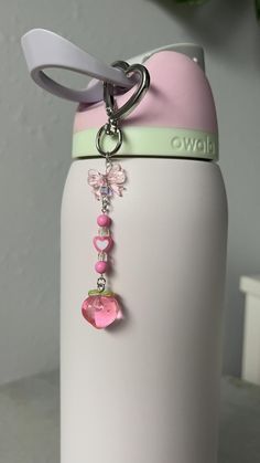 Cute pink/ clear acrylic key chain - the perfect accessory for your handbag, backpack, keys, or in this case a water bottle (owala)  The charm is held together by jewelry wire, and the heart shaped clasp makes the charm even cuter. Peach lovers rejoice, as this is the cutest peachy gift to give (or to gift yourself)  No water bottle included, only comes with the keychain. Water Bottle Accessories Owala, Owala Charm Ideas, Air Up Water Bottle Aesthetic, Water Bottle Keychain, Water Bottle Charm, Owala Water Bottle Aesthetic Accessories, Owala Water Bottle Pink, Water Bottle Charms, Pink Owala Water Bottle