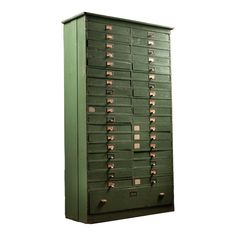 an old green filing cabinet with lots of drawers on the front and bottom shelves, against a white background