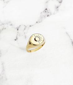 18K 14K Sun and Moon Signet ring, Engraved Round Signet Ring, Solid Gold Signet ring, Gold Pinky ring, 9K Gold chevalier ring, Women's Signet, Women's Pinky ring, 9K signet ring, Custom personalized signet chevalier ring, FREE EXPRESS SHIPPING Trendy yet classic chevalier ring with round head engraved with a lovely sun and moon design. Rings are made in 18K, 14K or 9K solid gold. Whisper... Live by the Sun, Love by the moon! ------------------------------------------- R I N G S P E C S Round/cir Celestial Style 14k Stamped Promise Ring, Engraved Celestial Promise Ring Jewelry, Dainty Gold-plated Sterling Silver Engraved Ring, Dainty Engraved Sterling Silver Ring In Gold, Adjustable 14k Gold Signet Ring Fine Jewelry, Gold Celestial Rings For Anniversary, Celestial Gold Crescent Rings, Celestial Crescent Gold Rings, Celestial Tarnish-resistant Rings For Anniversary