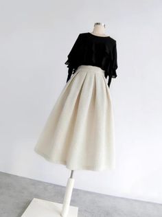 <Size>

 *Unit: cm 







 size 

 Waist 

 Length 











 S 

 64 

 68 






 M 

 68 

 68 






 L 

 72 

 69 






 XL

  76 

 69 






 2XL 

 80 

 70 













 <Material> 



 Wool Blend White A-line Skirt For Fall, Beige A-line Pleated Skirt For Fall, Fall Ruffled Beige Skirt, Beige Ruffle Skirt For Fall, Elegant Tweed Skirt For Fall, Spring Party Tweed Skirt, Chic Cream Fall Skirt, Fall Beige Tweed Skirt, Chic Tweed Skirt For Winter