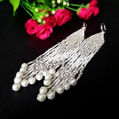 Silvery White Very Long Fringe Earrings. Sparkling, Gentle, Seed Beads Earrings. Indian Jewelry. Boho Style/ Waterfall earrings.These earrings are perfect for a wedding dress.Gradient bead earrings.Boho style Seed Beads earrings. Long Earrings. Beautiful,Sparkling, Elegant Earrings .A beautiful Christmas gift for women and girlfriend. These are long but not heavy earrings. Length of earrings 14 cm (5.50 inches). Width of earrings 0.78 inches. Materials;Czech seed beads.Czech Crystals.Japanese se Cheap White Beaded Earrings For Party, Elegant Silver Beaded Earrings For Party, Festive Beaded Dangle Pearl Earrings, Bohemian Bridal Earrings For Wedding, Handmade Silver Beaded Earrings For Party, Beaded Bohemian Chandelier Earrings For Party, Silver Beaded Drop Earrings For Party, Silver Handmade Beaded Earrings For Party, Silver Beaded Chandelier Earrings For Festive Occasions